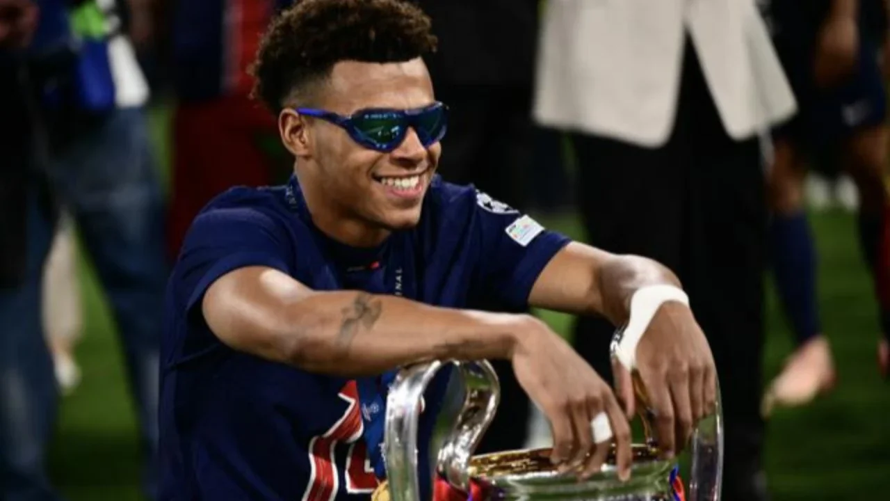 Pemain muda PSG, Desire Doue, melakukan selebrasi setelah mencetak gol ke gawang Inter Milan pada final Liga Champions 2024/2025 di Stadion Allianz Arena, Munich, Minggu (1/6/2025) dini hari WIB. (Sven Hoppe/dpa via AP)