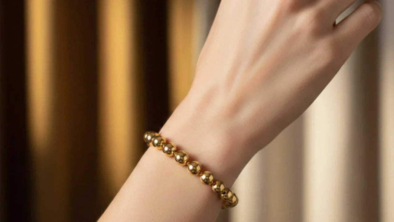 Model Gelang Emas Bola-Bola yang Manis untuk Acara Resmi (created by AI)