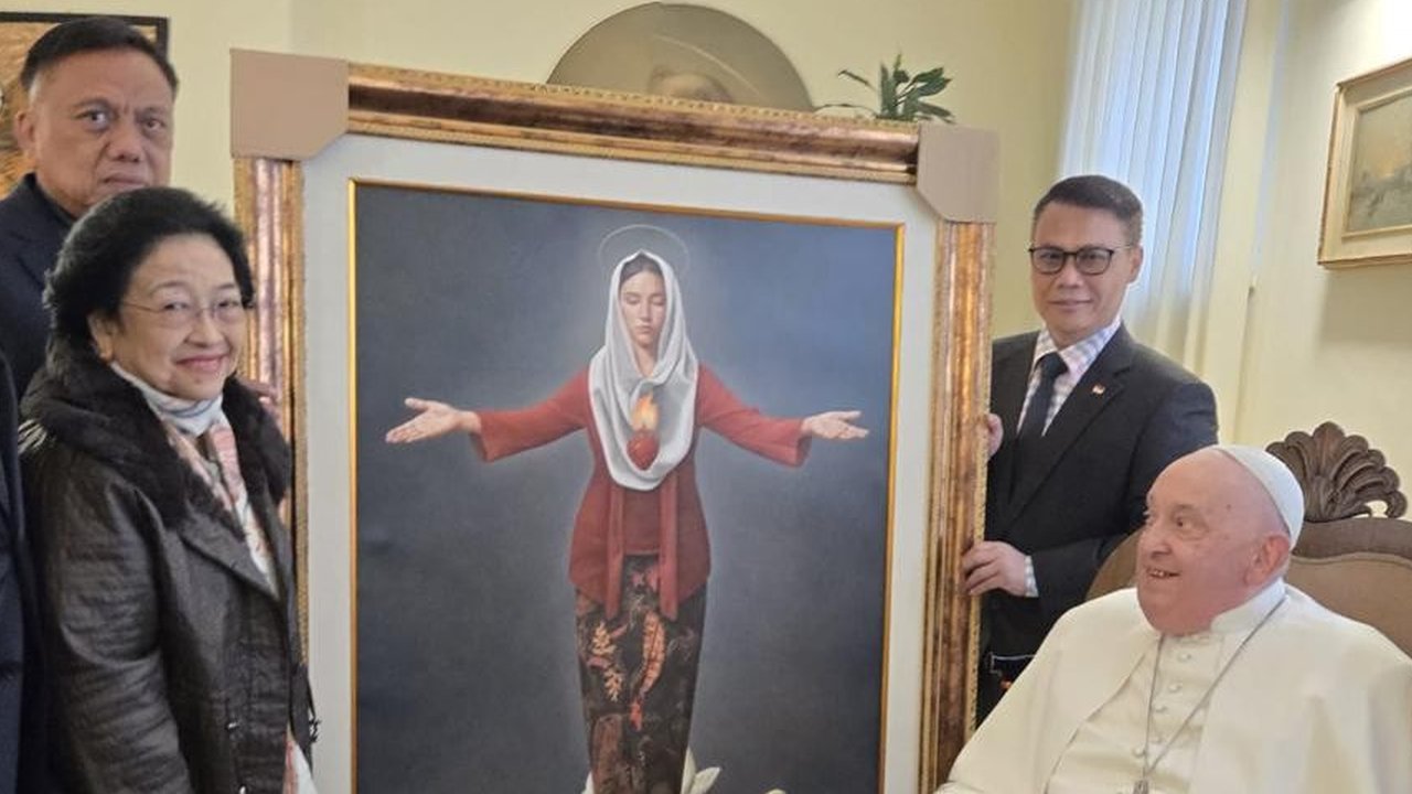 Olly Dondokambey Bersama Sang istri di Vatikan