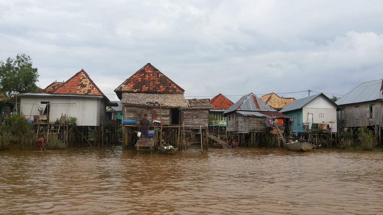 Rumah kayu dipinggiran Sungai Musi (Liputan6.com/Nefri Inge)