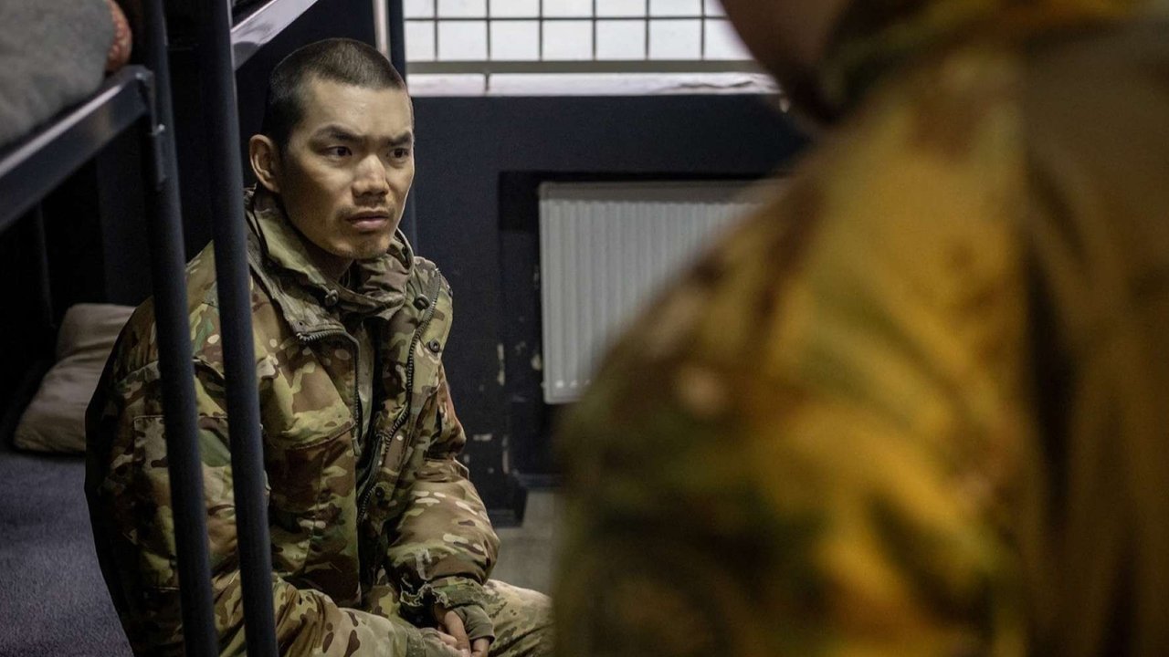 Foto yang dirilis Dinas Keamanan Ukraina (SBU), pada 9 April 2025, memperlihatkan seorang tentara yang mengaku sebagai warga negara China ditahan oleh otoritas Ukraina di lokasi yang dirahasiakan.