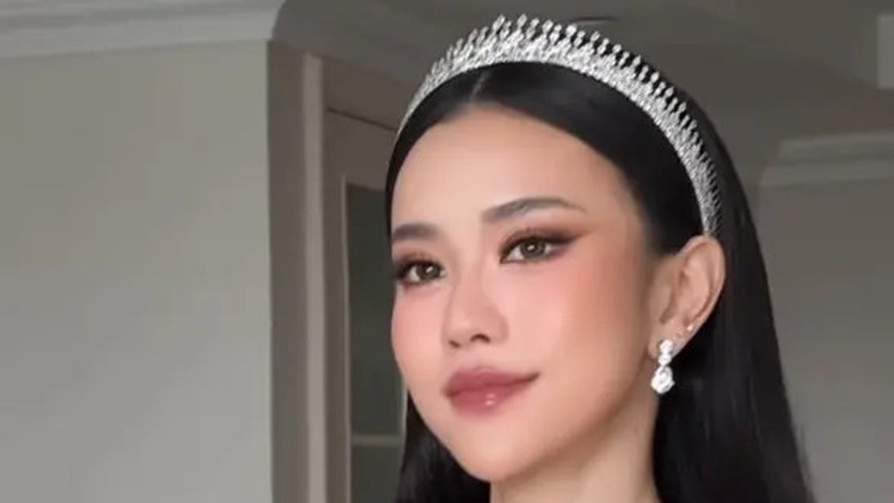 Gaun Putih Jessica Jane di Hari Pernikahannya Bersama Erwin Phan. [@imelvilentcia]