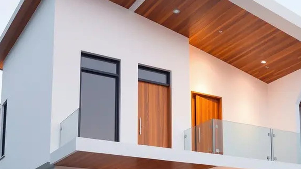 Model Rumah Minimalis Atap Dak Cor Bertingkat. Foto: Meta AI
