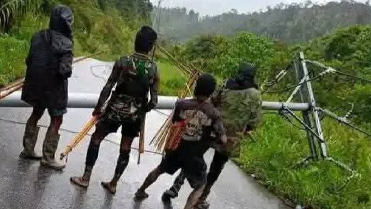 Polisi Ditembaki dan Dipanah KKB saat Patroli di kawasan Kali Tuka Dogiai, Satu Anggota Luka