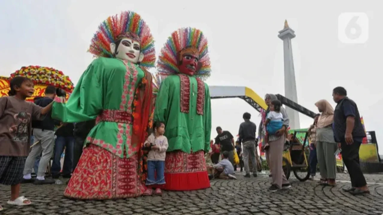 Lebaran Betawi 2025 mengusung tema Menyongsong Lima Abad dengan Semangat Mempererat Kearifan Lokal Masyarakat Betawi. (Liputan6.com/Angga Yuniar)
