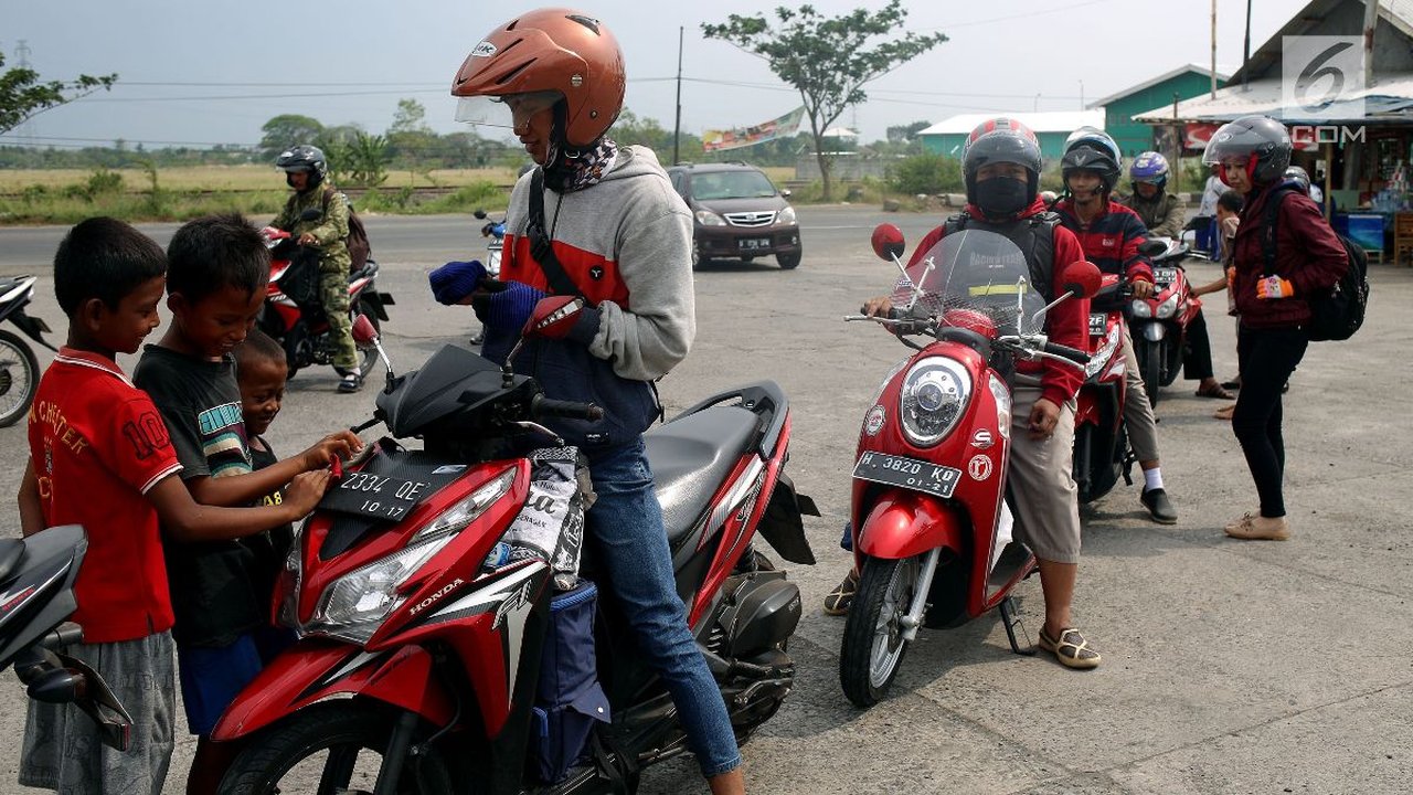 Bawa Anak Naik Motor? Simak 7 Tips Aman yang Wajib Dipraktikkan