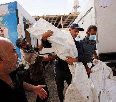 FOTO: Potret Pilu Jenazah Korban Serangan Israel di Jalur Gaza Disimpan di Truk Es Krim karena RS Penuh