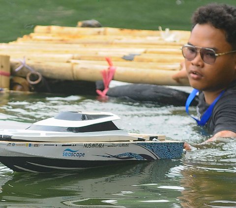 FOTO: Melihat Keseruan Kontes Kapal Cepat Tak Berawak Nasional 2023