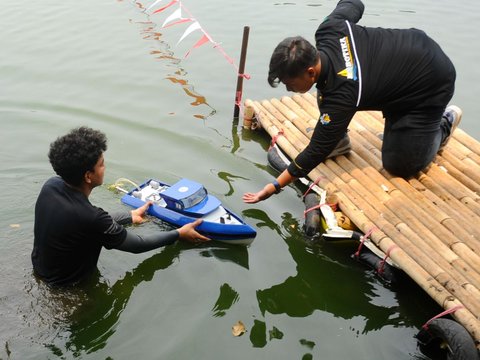 FOTO: Melihat Keseruan Kontes Kapal Cepat Tak Berawak Nasional 2023