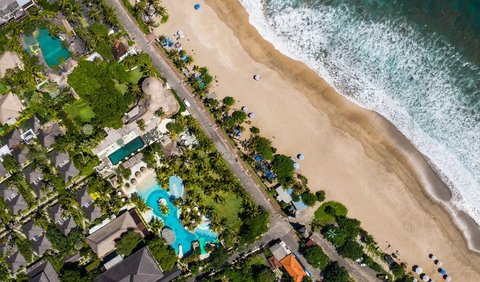 Pantai Kuta: Destinasi Tujuan Sunbathing<br>