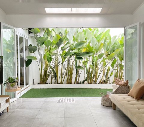Portrait of Old House Transformation into Cool Tropical-themed Home