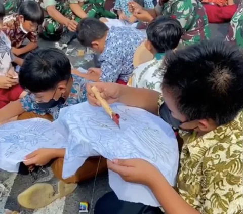 Pecahkan Rekor Muri saat Hari Batik, 1.000 Prajurit TNI Kompak Membatik di Tugu Jogja
