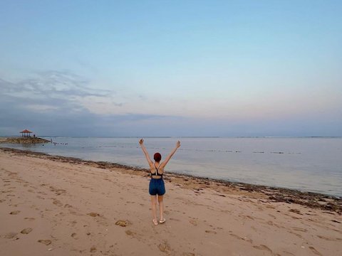 Portrait of Isyana Sarasvati Fearlessly Showing off Tattoo on Her Chest During Vacation