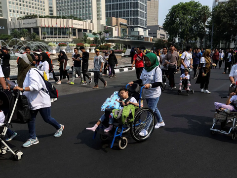 FOTO: Antusiasme Anak-Anak Pengidap Celebral Palsy Ikut Kampanye di Car Free Day