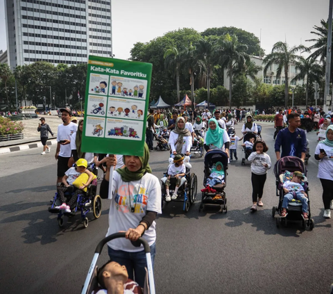 FOTO: Antusiasme Anak-Anak Pengidap Celebral Palsy Ikut Kampanye di Car Free Day