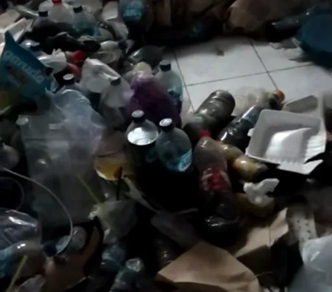 Viral Occupant of Boarding House Lives with Room Full of Trash, Contents of Bottles are Sickening