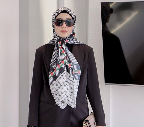 Dramatic Outfit by Richa Iskak with a Palestinian-style Keffiyeh Hijab