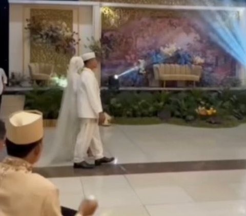 Making Nervous, Bride Nearly Falls Because of Naughty Child's Prank at Wedding
