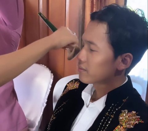The Action of a Bride who is a MUA, Doing Makeup for Her Own Husband