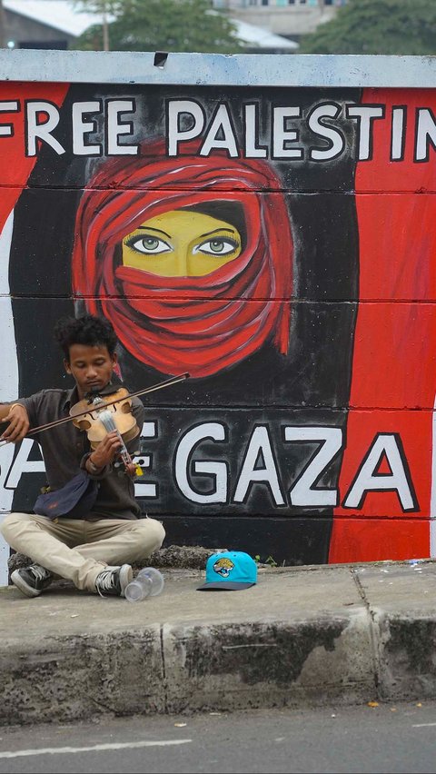 FOTO: Menggemakan Dukungan untuk Palestina Lewat Mural