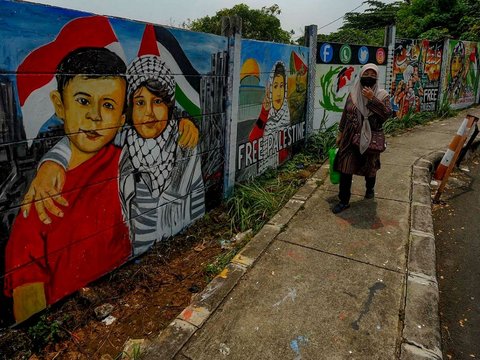 FOTO: Menggemakan Dukungan untuk Palestina Lewat Mural