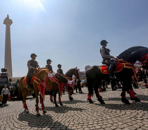 FOTO: 129 Ribu Personel Gabungan Dikerahkan untuk Pengamanan Natal dan Tahun Baru