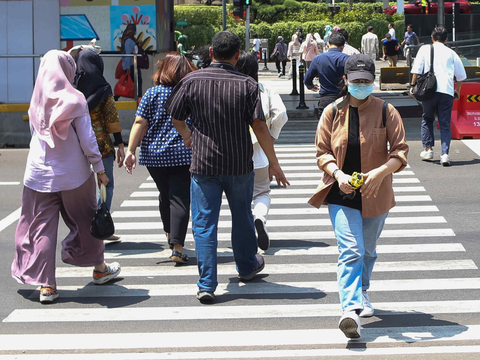 FOTO: Dinamika Perubahan Atmosfer, Suhu Udara Jakarta Kembali 
