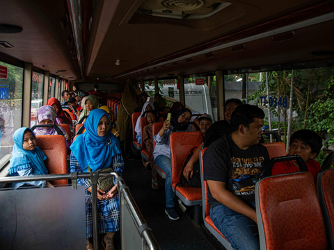 FOTO: Menikmati Keseruan Musim Liburan Nataru di Kota Tua hingga Keliling Jakarta Naik Bus Tingkat Gratis Transjakarta