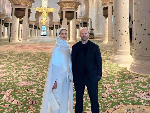 Portrait of Actress Rosie Huntington in White Hijab at the Grand Mosque Centre, Abu Dhabi