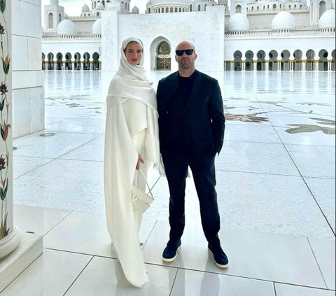 Portrait of Actress Rosie Huntington in White Hijab at the Grand Mosque Centre, Abu Dhabi