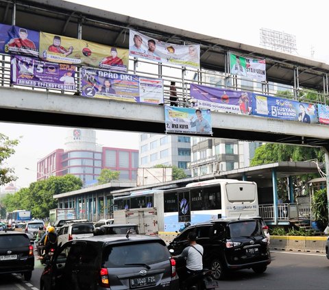 FOTO: Penampakan Spanduk dan Baliho Kampanye Bertebaran di Jakarta: Rusak Pemandangan hingga Langgar Aturan