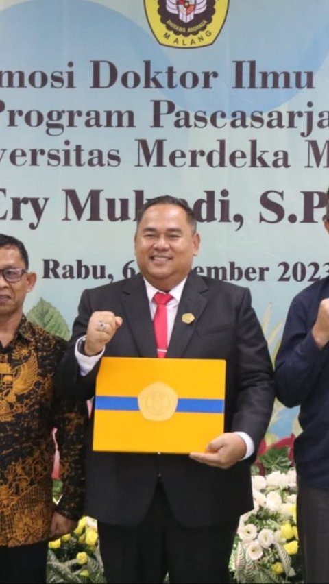 Lulus dengan Predikat Memuaskan, Kadis Kominfo Staper Kutai Timur Lulus Promosi Doktor