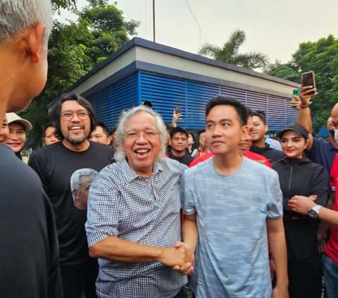 Gibran Salam Komando dengan Panda Nababan Saat Dampingi Ganjar Lari Pagi di Bogor