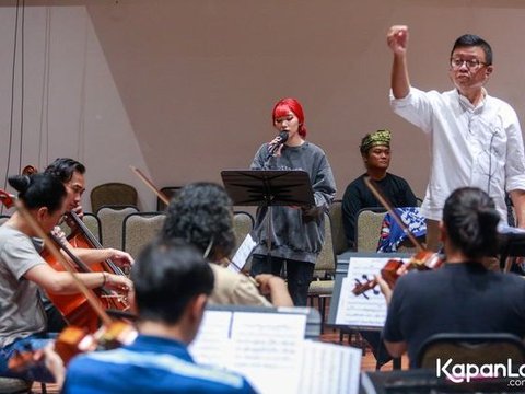 Potret Isyana Sarasvati yang Cantik dengan Busana Merah saat Latihan Menjelang Pagelaran 'Pahlawan Nusantara' dari Sabang hingga Merauke