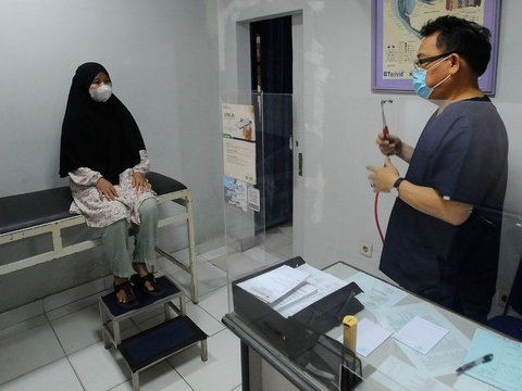 FOTO: Penderita ISPA Meningkat di Tengah Buruknya Polusi Udara Jakarta