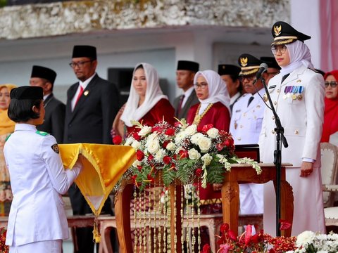 Meski Diguyur Hujan, Upacara HUT ke-78 RI di Banyuwangi Berlangsung Khidmat