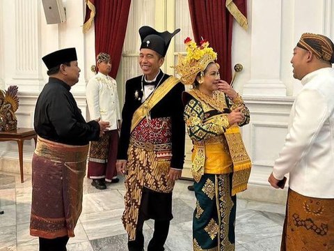 Kenakan Baju Adat Melayu