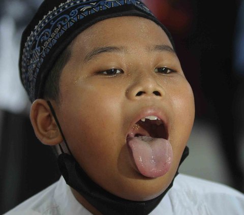 FOTO: Pemeriksaan Kesehatan Murid SD di Tengah Buruknya Polusi Udara Jakarta