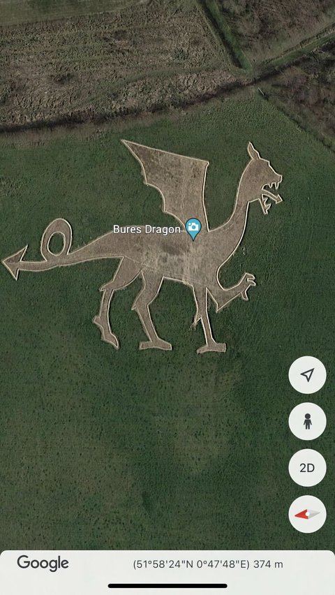 Image of a dragon in a field in Bures, England.