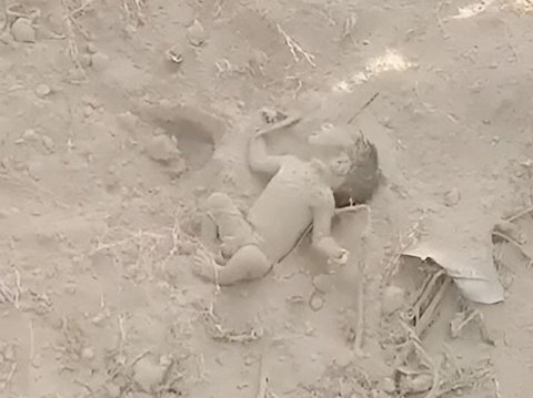Crying is Heard and a Tiny Hand Emerges from the Ground, Turns Out a Newborn Baby Buried Alive by Parents