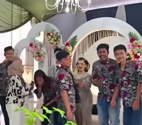 Hilarious! This is What Happens When a Couple Buys Matching Clothes Online, But Ends Up Twinning with the Wedding Entourage