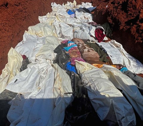 FOTO: Tewaskan 11 Ribu Orang, Beginilah Penampakan Kuburan Massal Korban Banjir di Libya