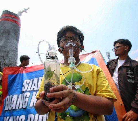 FOTO:  Pawai Global Climate Strike, Komunitas Peduli Lingkungan Suarakan Dampak Krisis Iklim