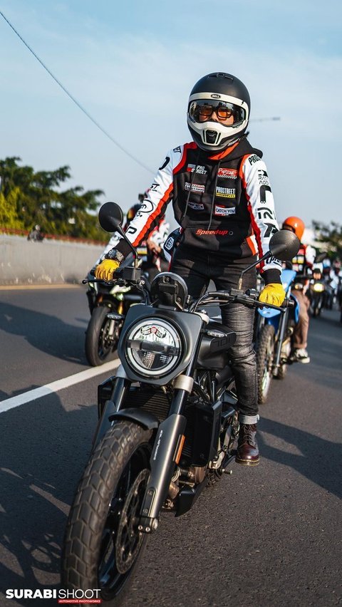 Portrait of Beautiful Artists Riding Motorcycles in Style