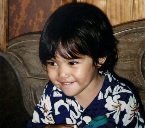 This Adorable Smiling Child is a Famous Artist's Son and Newly Single, Can You Guess?