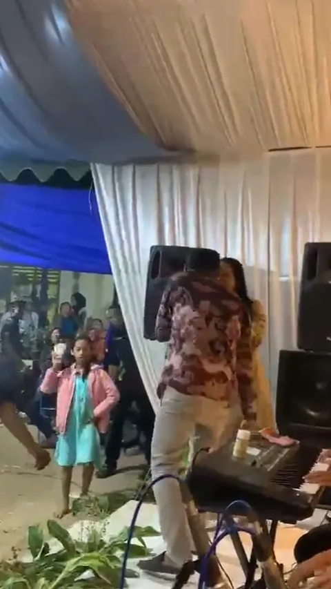 Having Fun Dancing with a Beautiful Singer, Husband Confronted by Wife and Child, Sandal Thrown on Stage