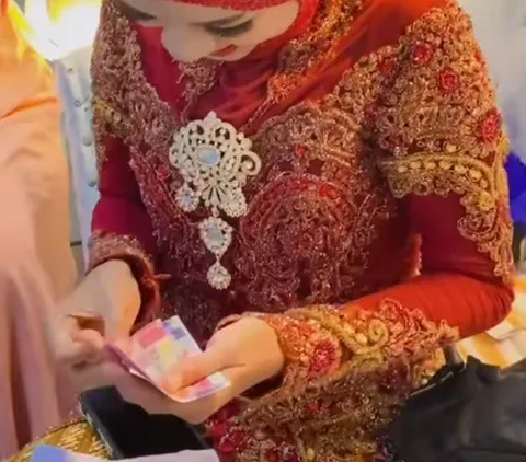 Moment Bride Opens Envelope, the Contents are Hilariously Disappointing