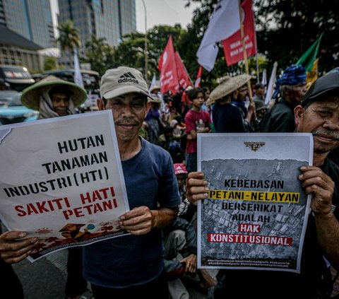 FOTO: Memperingati Hari Tani, Massa Buruh hingga Serikat Petani Minta Enam Tuntutan di Patung Kuda