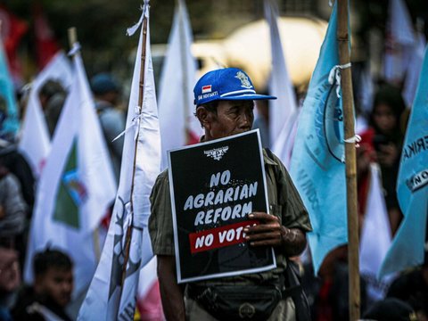 FOTO: Memperingati Hari Tani, Massa Buruh hingga Serikat Petani Minta Enam Tuntutan di Patung Kuda