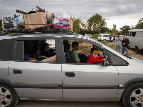 FOTO: Kepanikan Warga Armenia Bondong-Bondong Meninggalkan Wilayah Nagorno-Karabakh Usai Direbut Azerbaijan